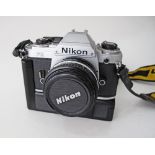Nikon film camera FG for film with motor drive together with a Nikon Nikkor 50mm F/1.8 G AF-S