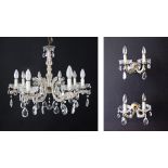 A vintage eight light crystal chandelier W66cm, together with a pair of two light wall sconces. (3)