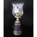 A Sevres blue and gilt porcelain table lamp with clear engraved shade, H50cm incl. glass shade c20th