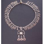 An Islamic / Ottoman silver necklace with filigree details, 60g, L36cm.