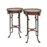 A pair of French Louis XVI style gueridons / serpentine side tables with decorative floral penwork