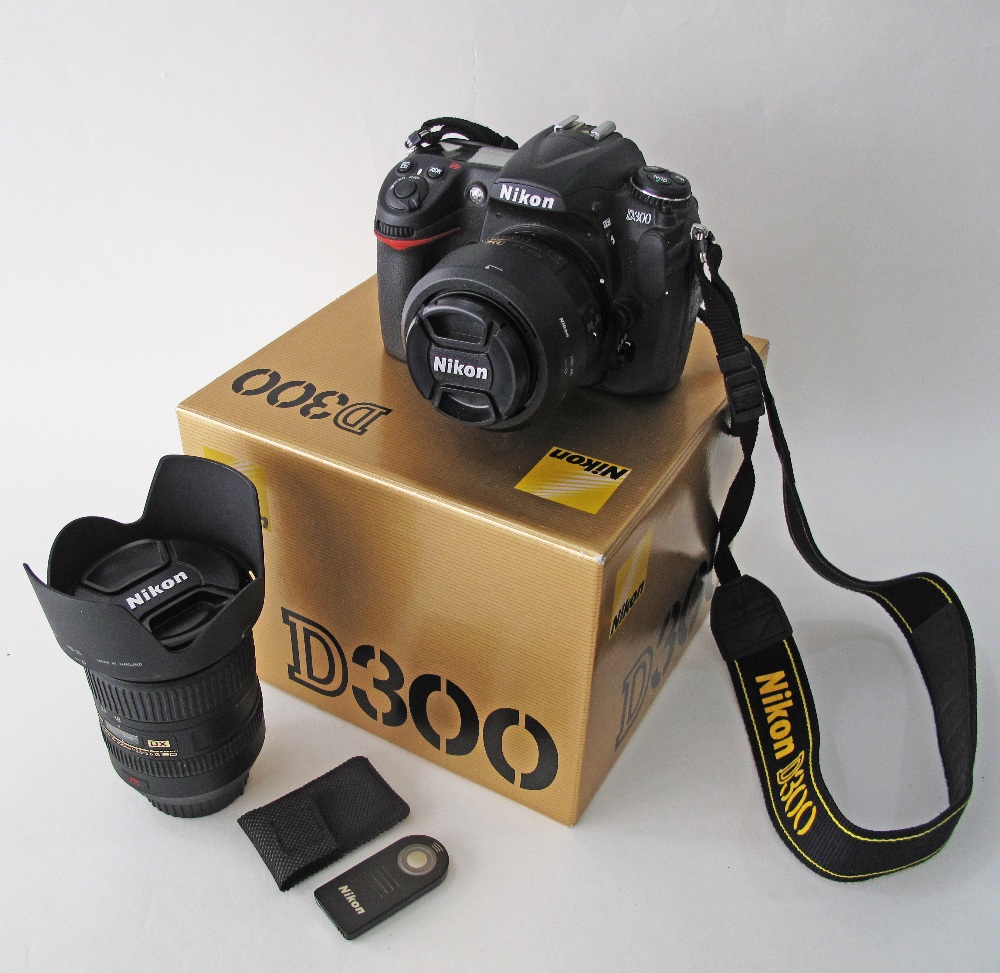 Nikon D300 Digital SLR Camera Body together with a Nikon Nikkor 35mm F/1.8 G DX AF-S Autofocus