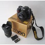 Nikon D300 Digital SLR Camera Body together with a Nikon Nikkor 35mm F/1.8 G DX AF-S Autofocus