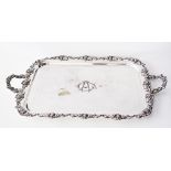 An English silver plated tray by Slack & Barlow Sheffield c1920s with elaborate border decorated