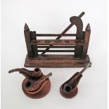 A collection of 3 pipes and pipe tidy stands. The big stand W30cm. (6)