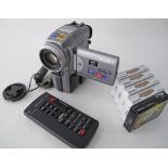 A SONY PCII5E Digital Handycam together with remote control and 5 cassettes unused.