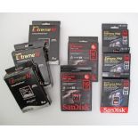 A collection of SanDisk memory cards comprising 2x16MB SDHC cards, 3x64MB SDXC Extreme PRO UHS-II