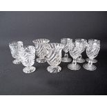 Baccarat Depose. A collection of nine pressed glass stemmed goblets, swirl cut, marked "BACCARAT