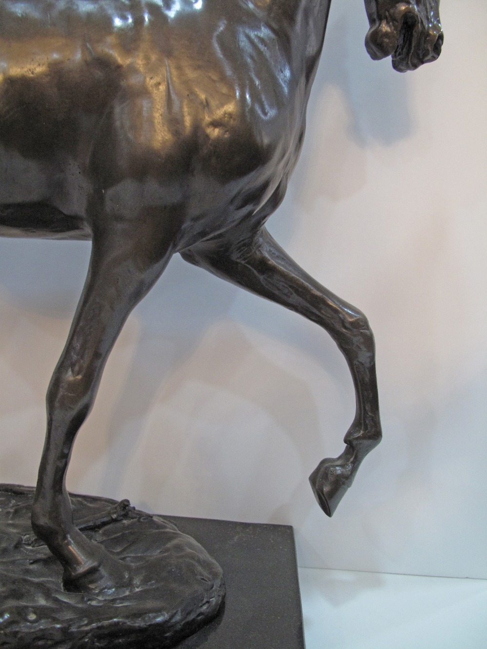 A patinated bronze figure of a prancing horse on a black marble base, late 20th / early 21st - Image 11 of 13