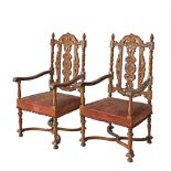 Cypriot, Andreas Savvides. A pair of carved walnut fauteuils / throne chairs in the Carolean or