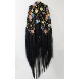 A large Spanish Manila Shawl (Manton de Manila) silk scarf, with fringe at the end and colourful