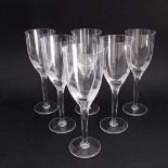 A set of six Lalique crystal Angel champagne flutes with frosted angel heads to the stems and etched