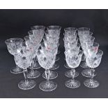 A collection of Bohemian hand cut lead crystal glasses comprising of eleven tall wine glasses H18cm,