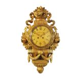 A Swedish giltwood Cartel clock, with printed dial and movement striking on a bell. (with key &