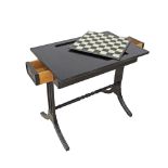 A black painted Chess / games table with two frieze drawers on the narrow sides. 75X50cm, H67cm.