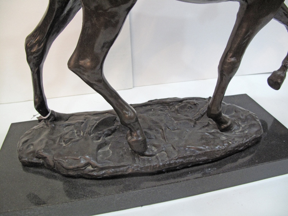 A patinated bronze figure of a prancing horse on a black marble base, late 20th / early 21st - Image 8 of 13