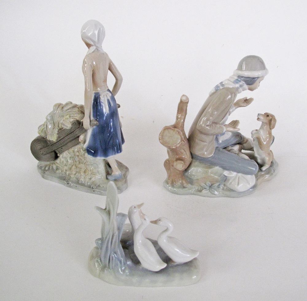 A collection of two Nao figures and a fake Sitzendorf. H12cm, H19cm, H23cm (3) - Image 2 of 3