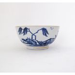 A Chinese export blue and white bowl, circa 1770, decorated with a river landscape scene with