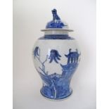 A large Chinese export blue and white porcelain vase and cover, 18th Century, with dog of Fo finial,