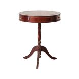 Cypriot, Pambos Savvides Regency style drum side table, with leather inset top, three frieze