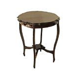 A round serpentine mahogany side table Diam.61cm, H72cm.