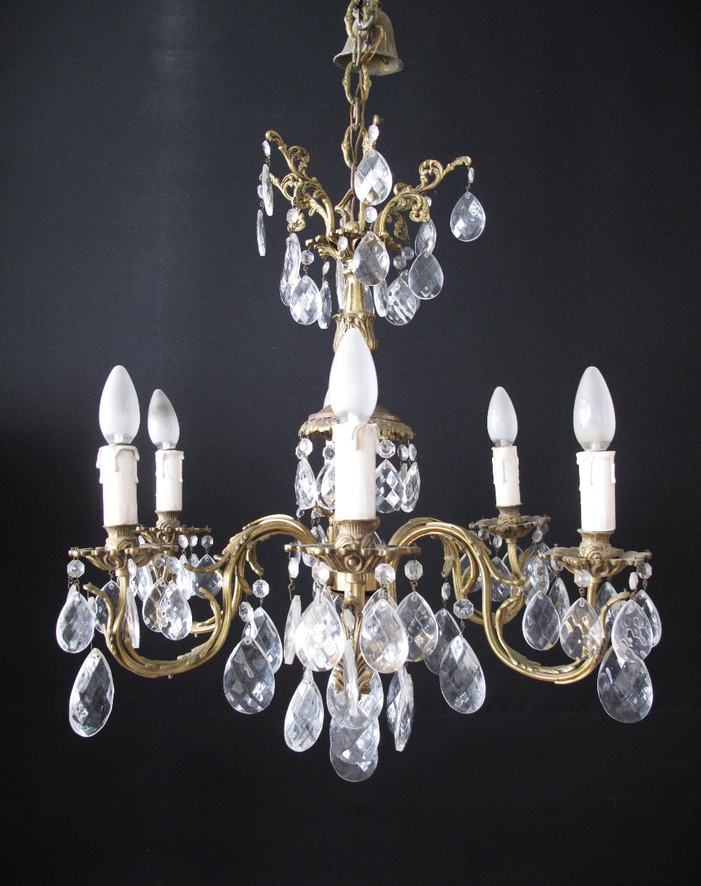 A brass and crystal six light chandelier, W60cm, H60cm.