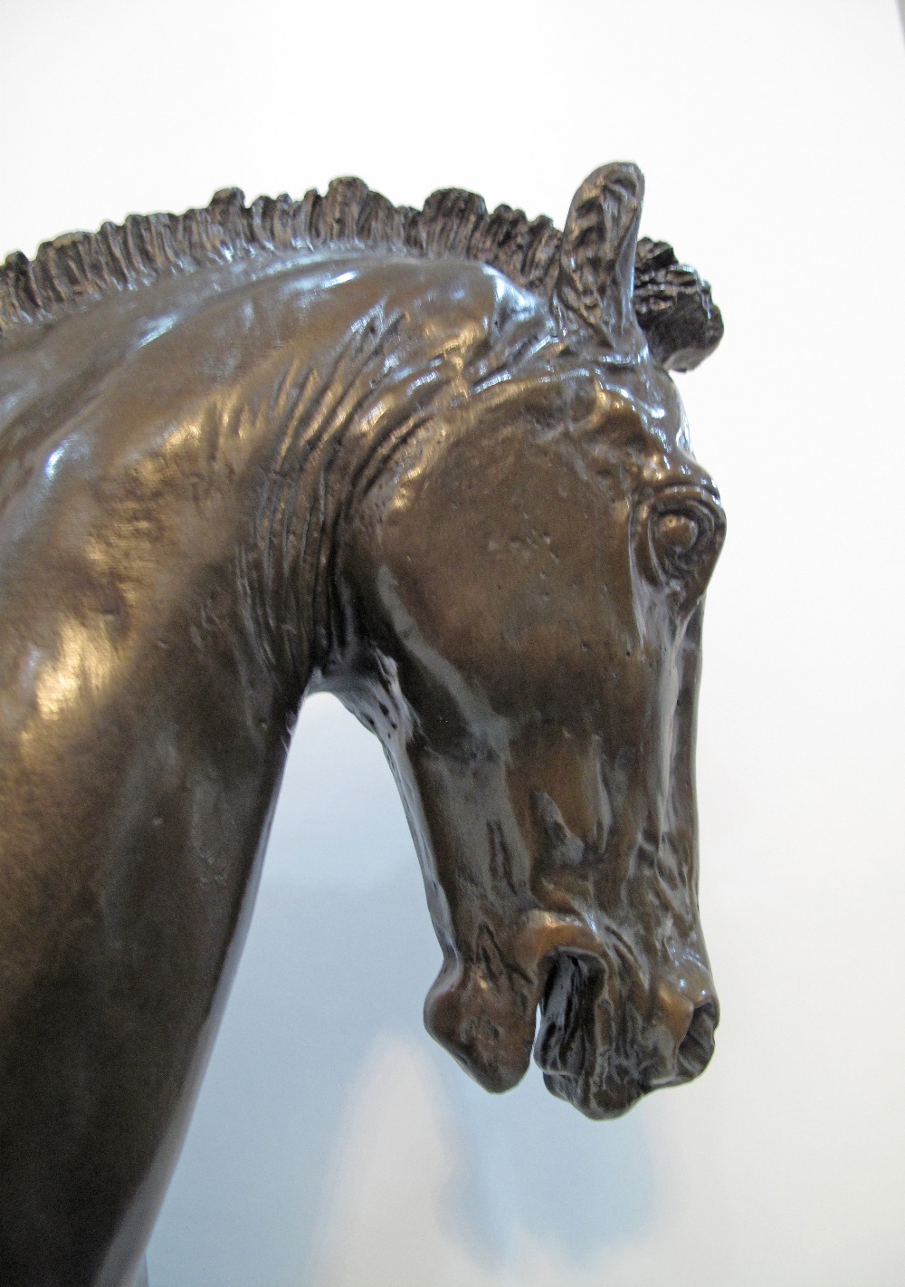 A patinated bronze figure of a prancing horse on a black marble base, late 20th / early 21st - Image 13 of 13