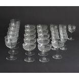A collection of fine 1930s hand blown and etched glasses comprising of five large goblets, eleven
