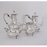 An Egyptian mid century silver 900 tea set comprising a coffee pot 814g, a tea pot 743g, a sugar
