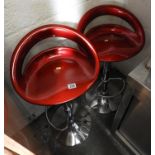 Pair of Red and Chrome Rise and Fall Stools