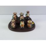 Quantity of Royal Doulton Miniature Toby Jugs on Display Stand