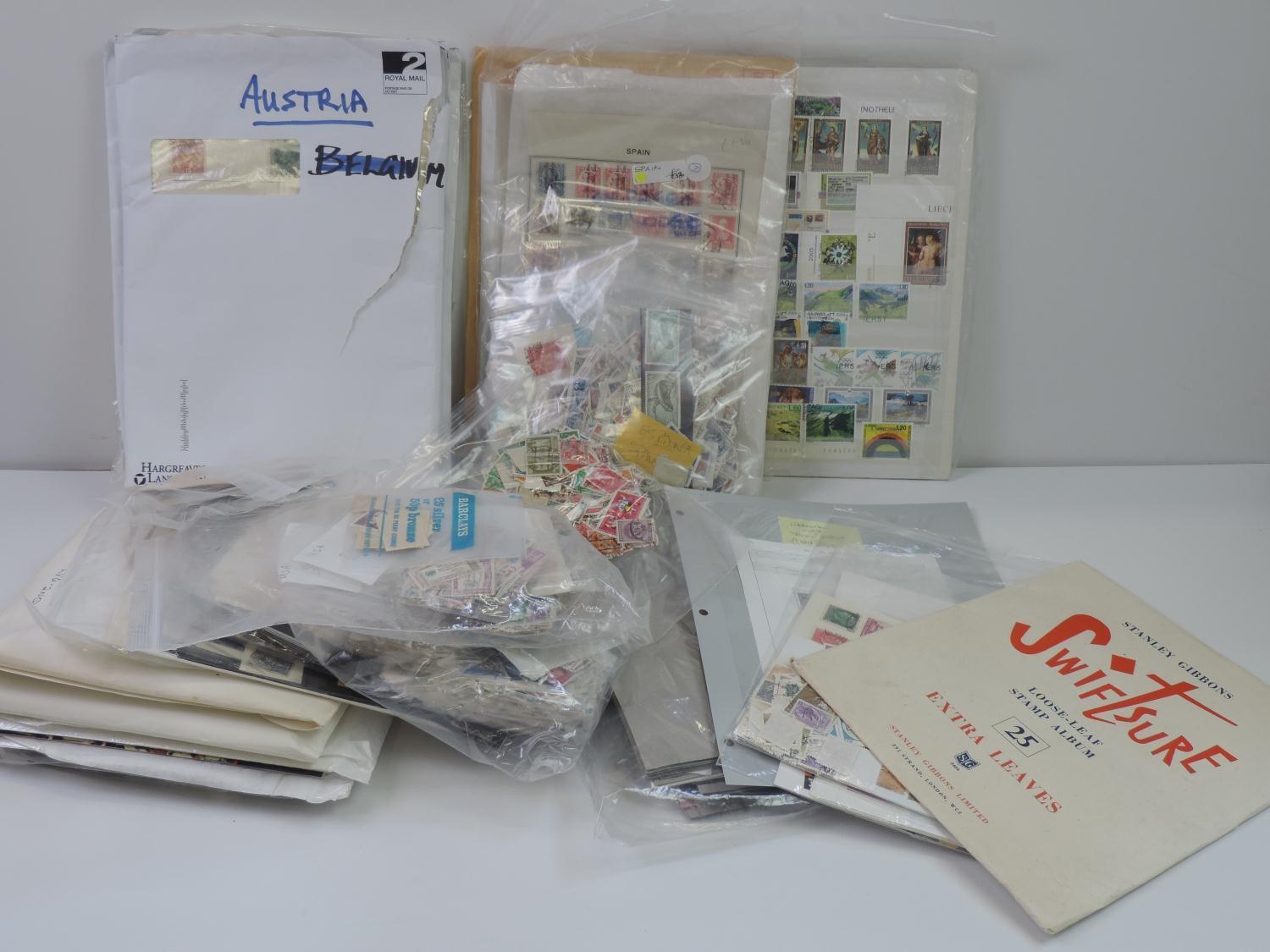 Large Box of World Stamps in Packets, on Pages and Loose - 1000's