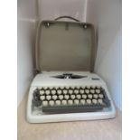 Cased Adler Typewriter