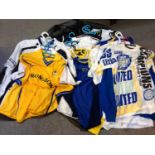 Large Quantity of Unused Leeds United Football Shirts