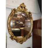 Oval Gilt Framed Mirror with Cherub Decorations - A/F