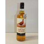 Bottle of Famous Grouse Whisky