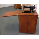 Sewing Machine in Cabinet