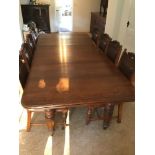 Oak extending wind out dining table with two leaves and 8x Matching Chairs