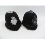 2x Policeman's Helmets with Badges - One Norfolk One Newport