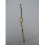 9ct Gold Ladies Watch on Gold Strap - Total Weight 17.8gms
