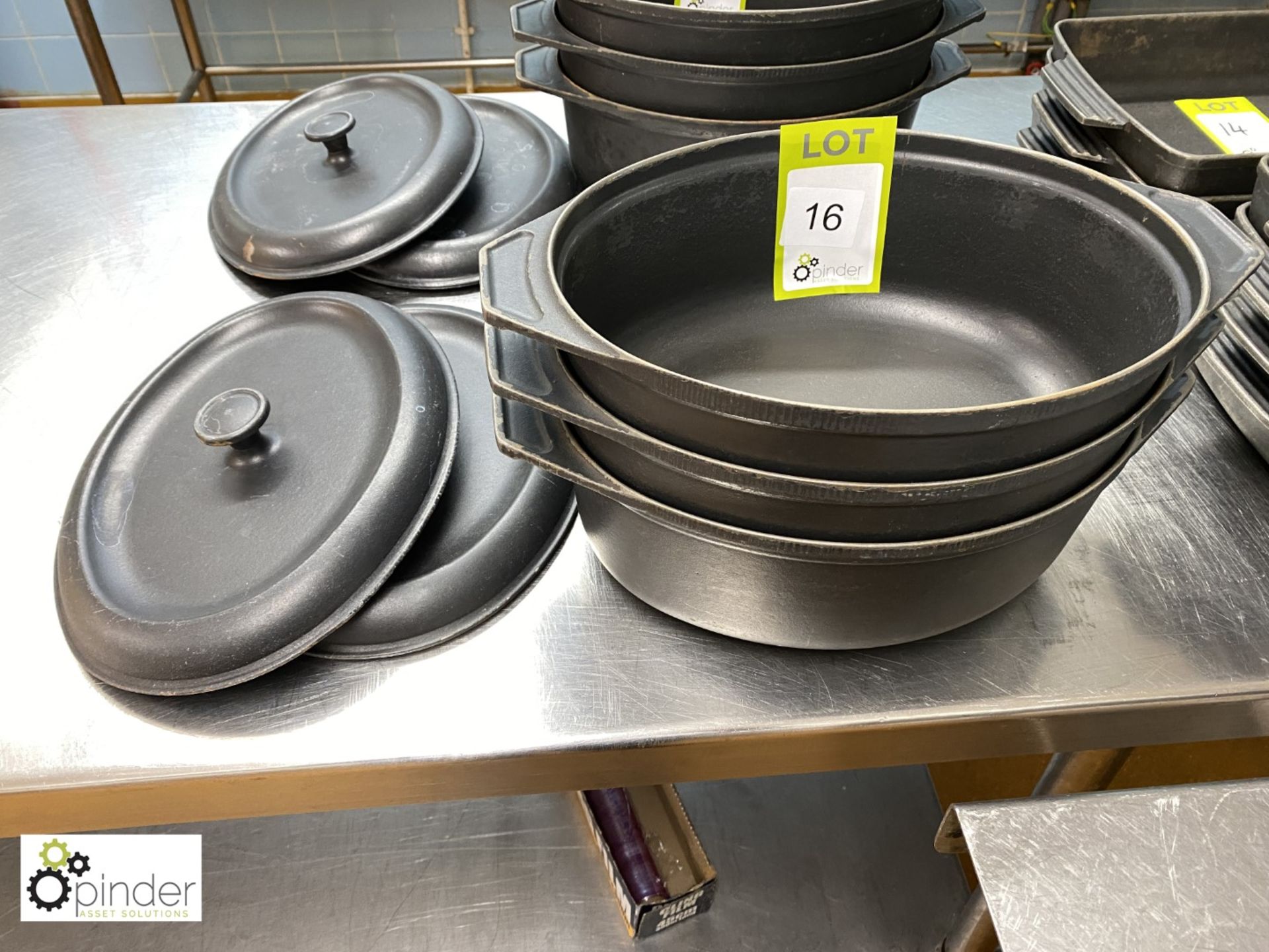 3 cast iron Casserole Dishes, with 2 lids (located in Main Kitchen)