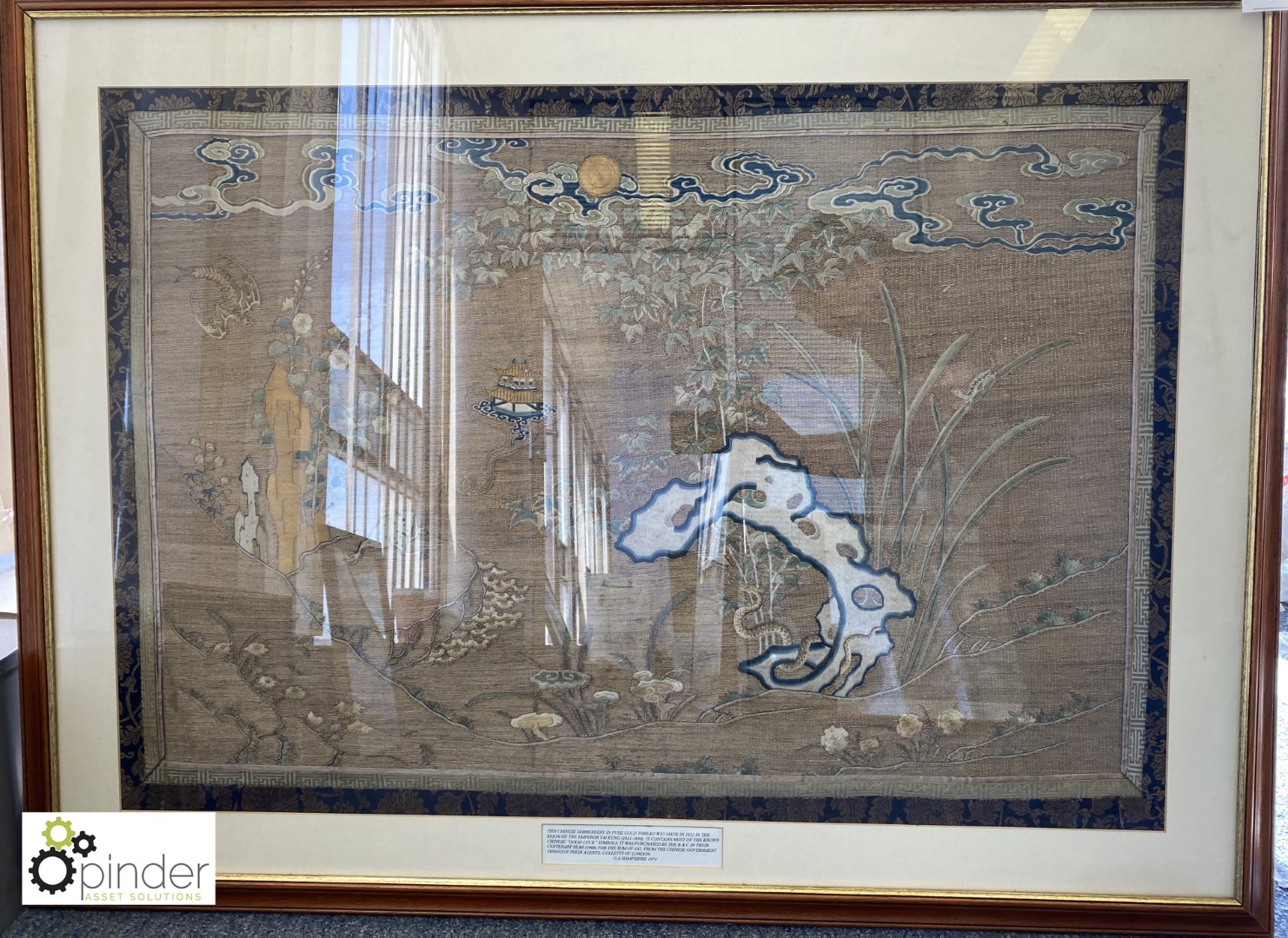 Framed and glazed Chinese Embroidery in pure gold thread, made in 1822, containing many Chinese good