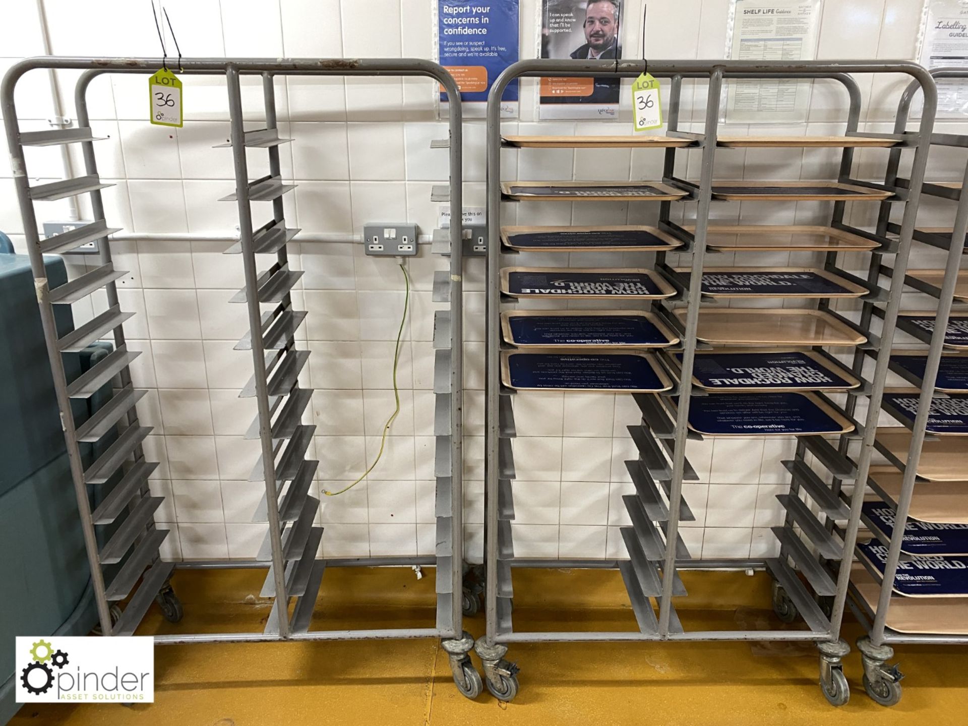 2 tubular framed 24-tray mobile Racks (located in Main Kitchen, Basement) **** please note this