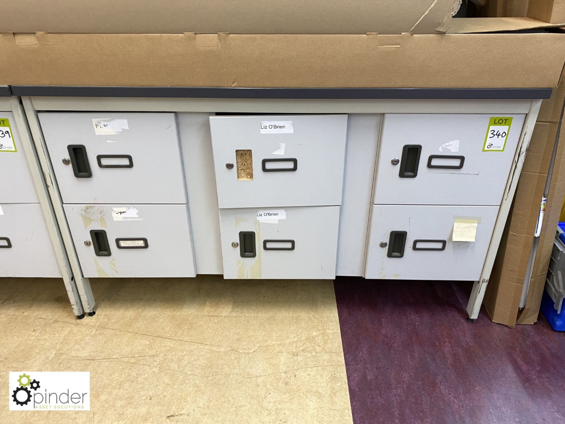 Steel framed Workbench, 1500mm x 750mm x 915mm, with 6-door lockers (located in Mail Room, Ground
