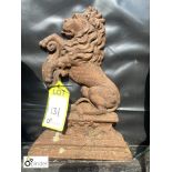 Victorian cast iron Door Stop depicting a seated lion, approx. 15in high