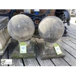 Pair of reconstituted Balls on pedestals, approx. 17in high x 10in diameter