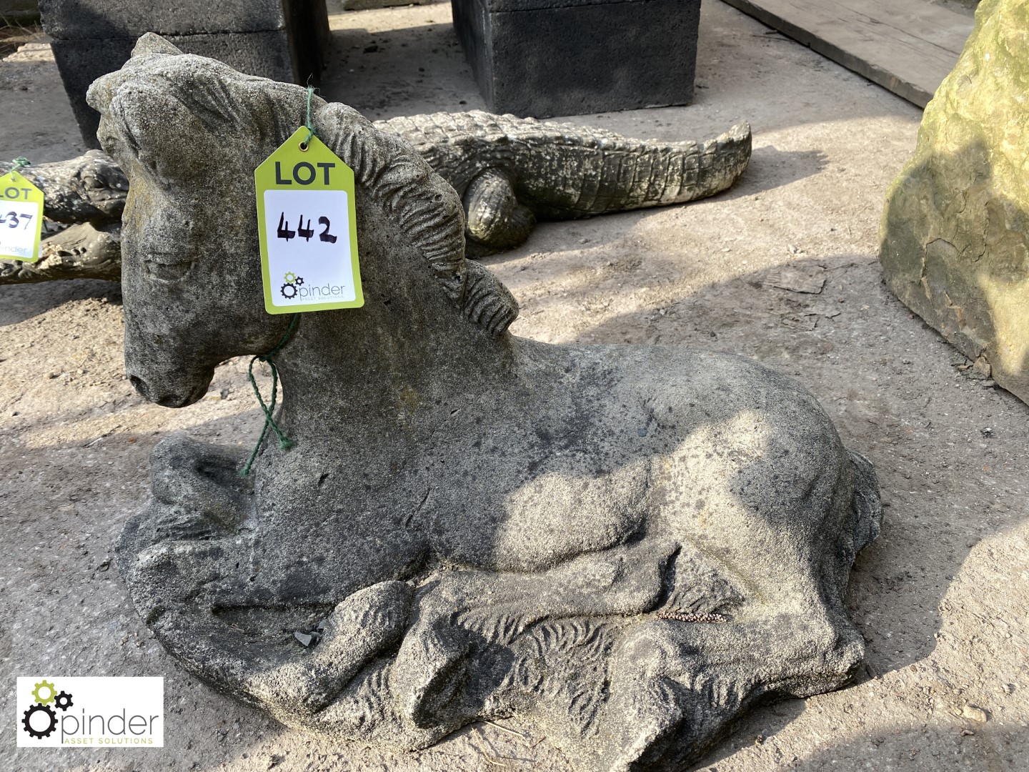 Reconstituted stone Reclining Foal, approx. 14in high x 24in long