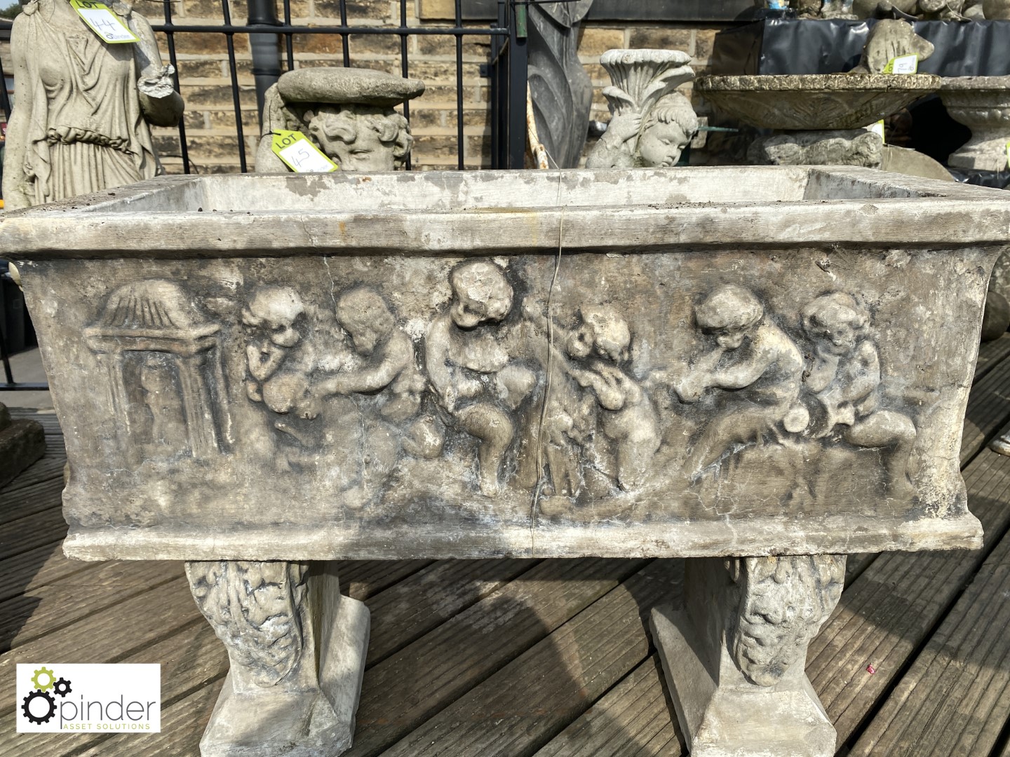 Rectangular reconstituted stone Planter standing on corbeled legs depicting putti playing, approx. - Image 2 of 4