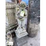 Reconstituted stone Cherub on base carrying a bowl of fruit, approx. 45in high