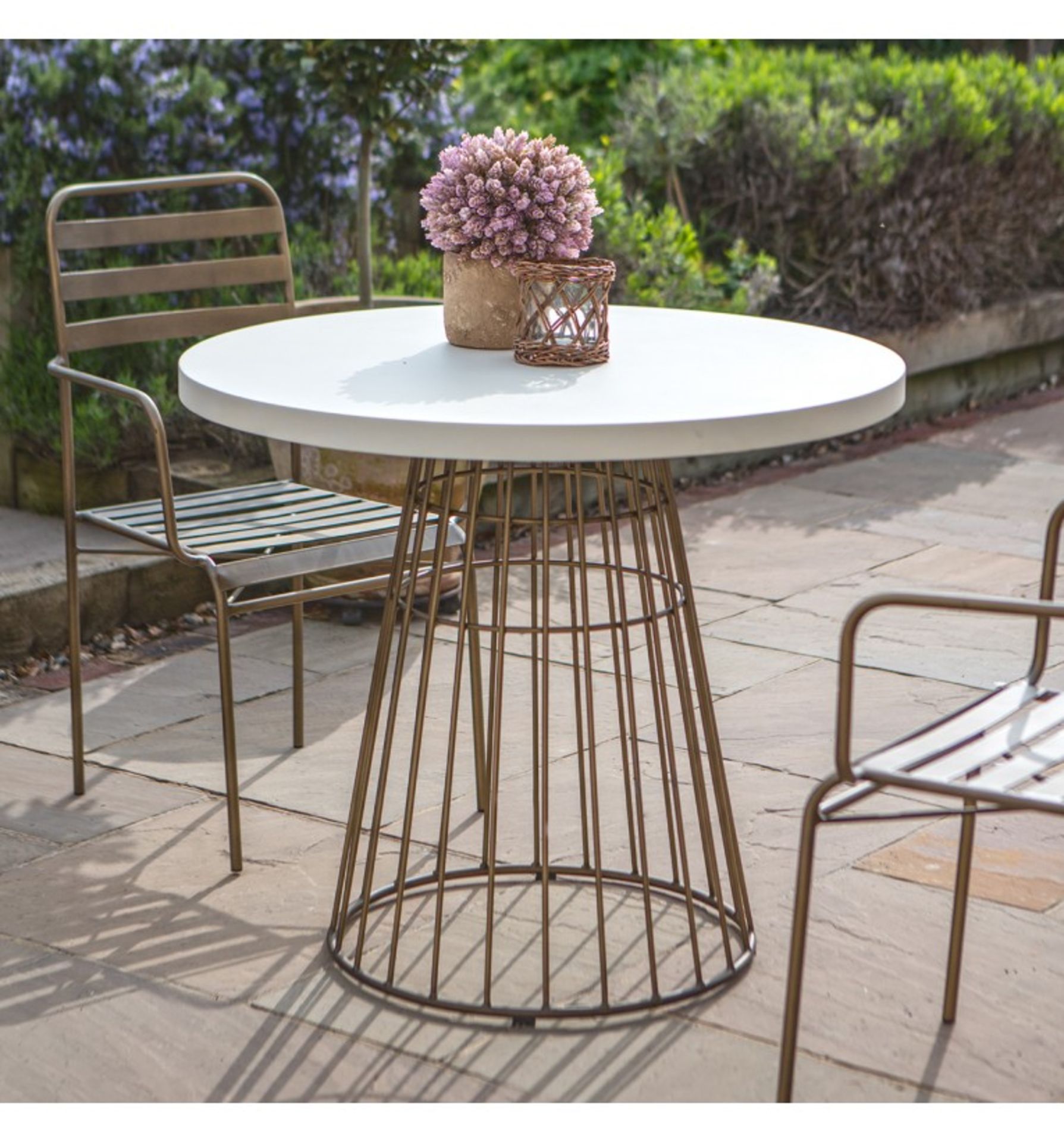 Greenwich Bistro Table Add this bronzed cage framed Bistrot table to your living space; this space